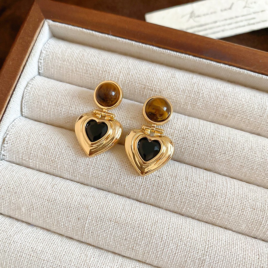 Pendientes de ojo de tigre artificial de color café Maillard con aguja de plata Pendientes simples y de moda de todo fósforo Pendientes ligeros de lujo de alta gama