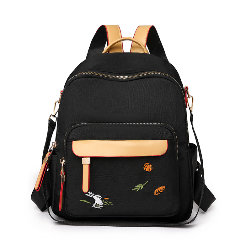 2024 nueva mochila para mujer, mochila de bordado de ocio de gran capacidad, mochila de viaje de viaje de nailon ligero al por mayor