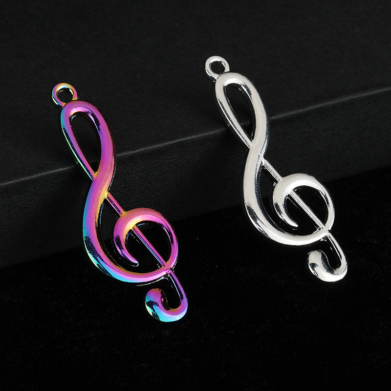 Creative exquisite gift music symbol key chain small pendant men and women couple car bag accessories wholesale
