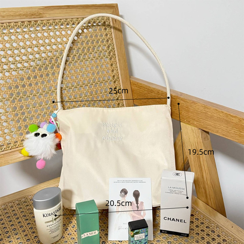 Bolsa de mano de estilo coreano de alto nivel, bolsas de mano de nicho de lujo ligeras, bolsas de actividades de apertura de belleza, bolsas de regalo prácticas para clientes