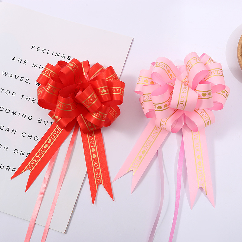 Nuevo embalaje de regalo de Navidad transfronterizo 30 letra mediana Blanco macaron multi-estilo Flor de extracción de mano Flor de nueve secciones multi-color