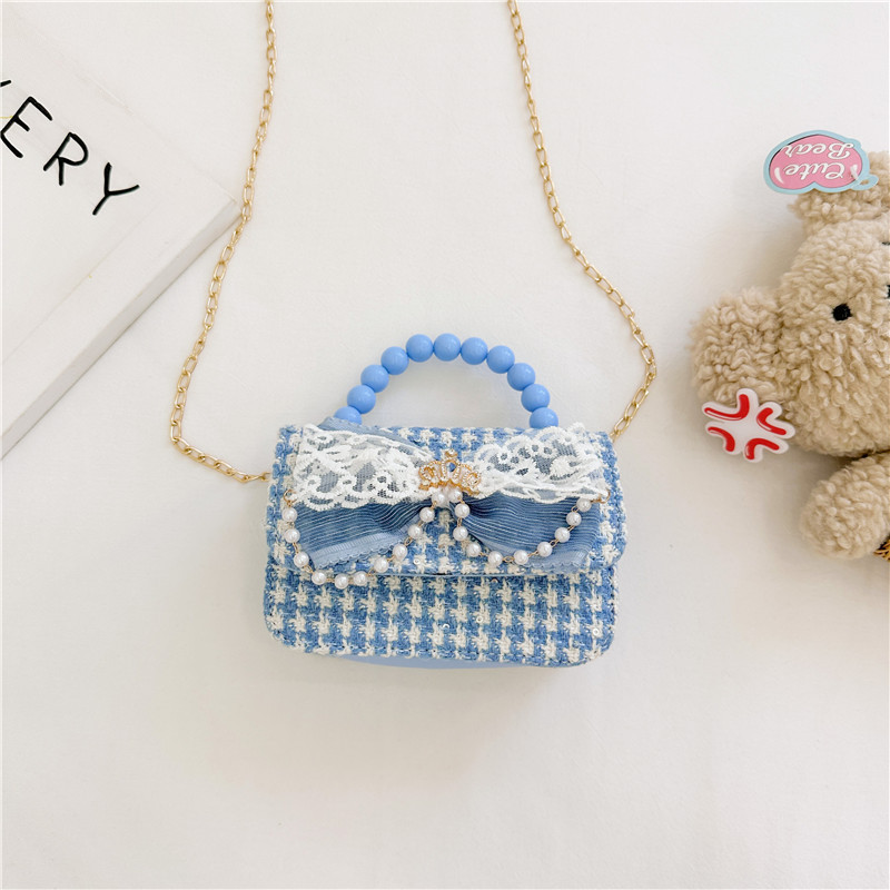 2024 nueva moda lindas bolsas de hombro para niños bolsas de perlas a cuadrícula bolsas extranjeras bolsas de hombro para niñas gran capacidad marea