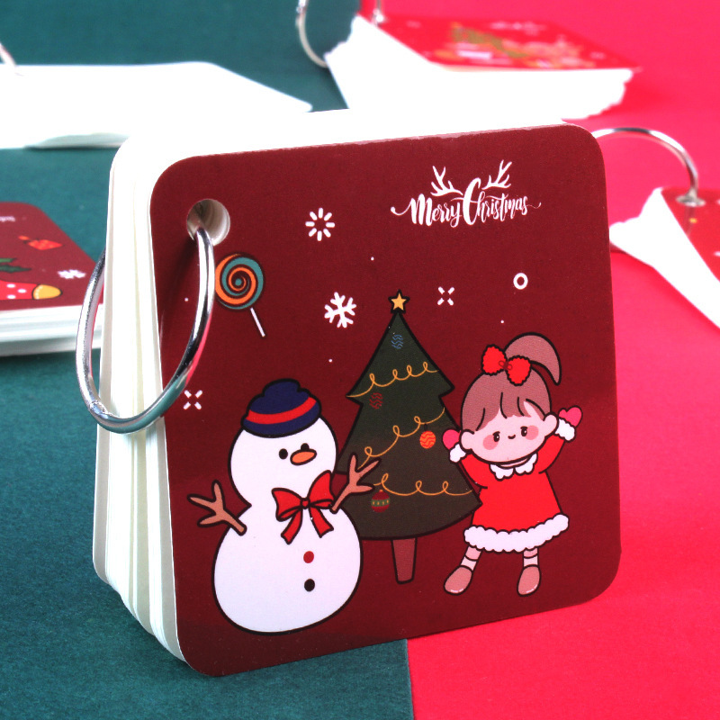 クリスマスの鉄の輪の本の環は本の学生の携帯ポケットのメモの付箋の空白の英語の単語のバインダーの本を掛けます。|undefined