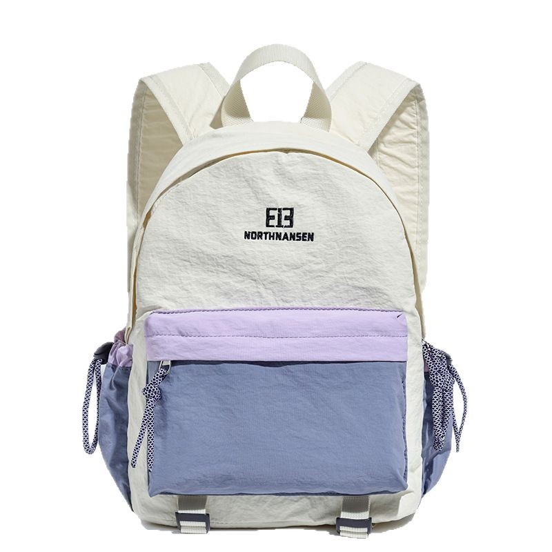 Nueva mochila de viaje al aire libre ligera para estudiantes universitarios mochila escolar pequeña simple versión coreana de color en contraste mochila fresca pequeña