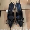 With bow, black