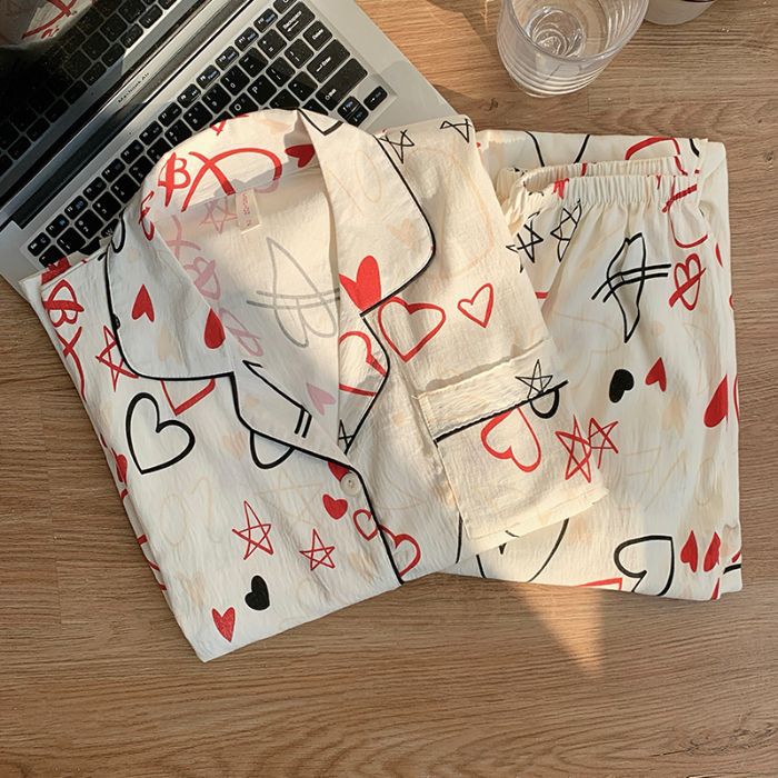 Nuevo conjunto de pijamas de algodón nublado transfronterizo de manga larga delgada primavera y otoño de mujeres lindos pantalones de dibujos animados dulces ropa para el hogar