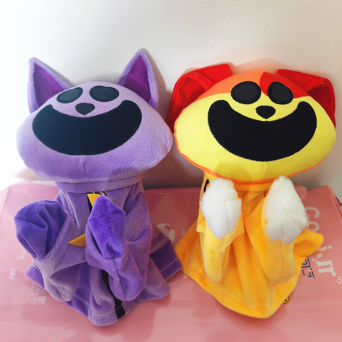 Cross-border smiling critters horror smile animal doll orange cat purple cat boxing interactive doll wholesale