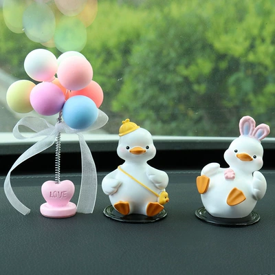 Car ornaments – Women - good-duck-lying-down-duck-comes-with-anti-slip-mat-colorful-shaking-head-balloon