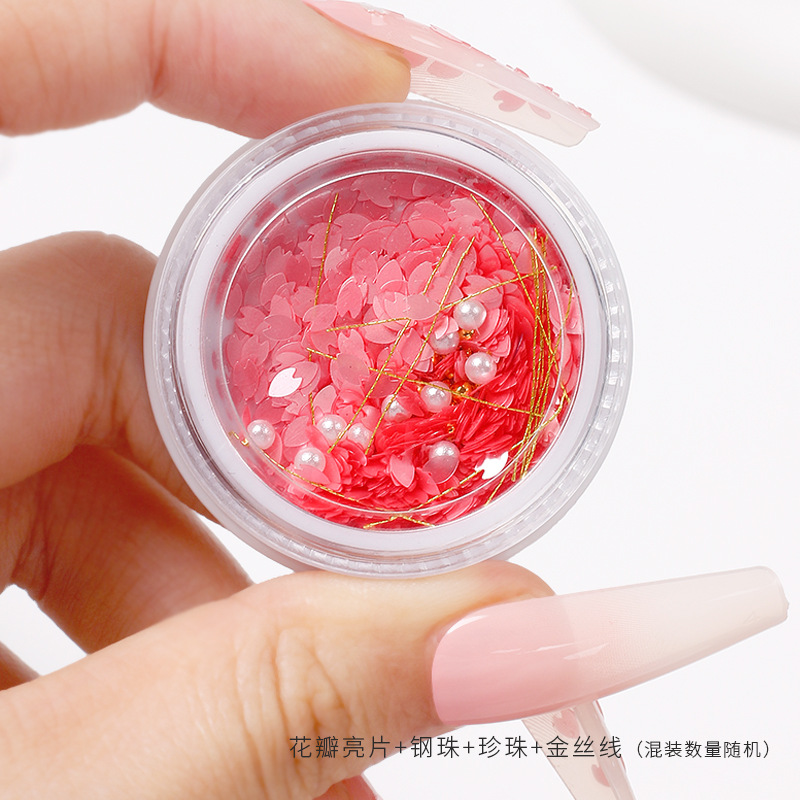 Nueva línea popular flor de cerezo lentejuelas ultra-Delgado pétalos todo partido chica corazón perla hilo de oro mezclado DIY accesorios de uñas