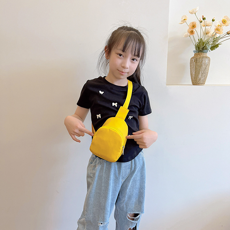 Bolso de pecho coreano para niños y niñas, estilo extranjero, mini bolso de moda de color sólido para niños, 2025 nuevo bolso de comercio exterior para niños