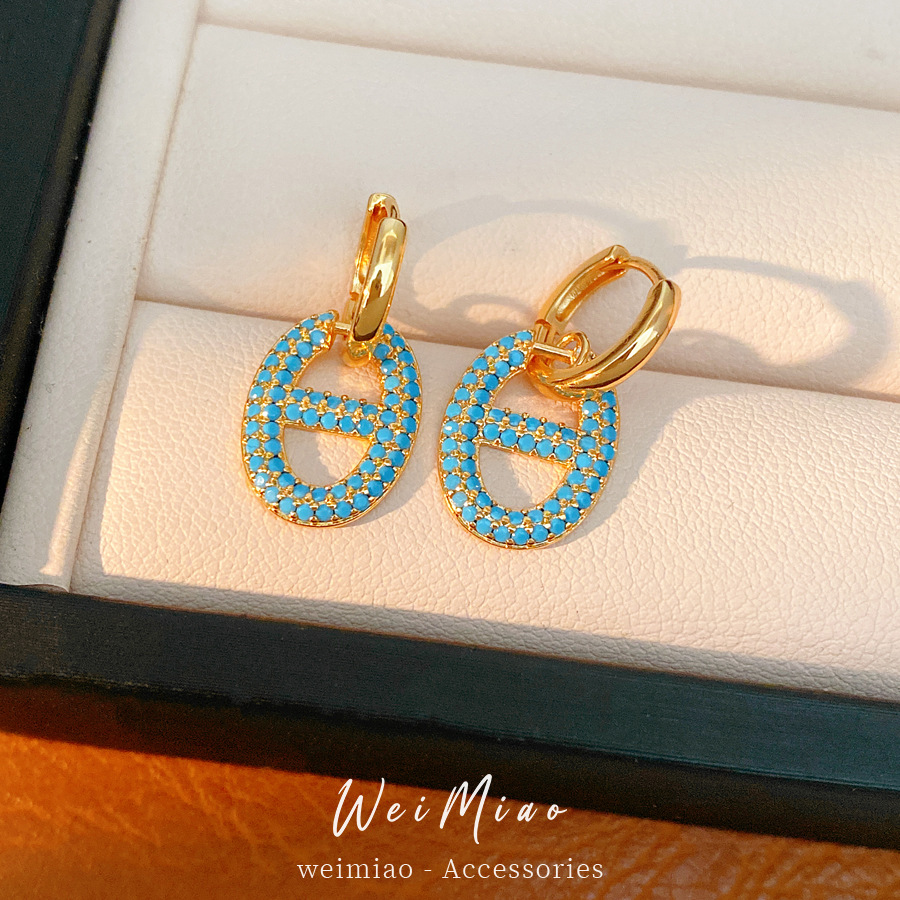 Zircon oval nariz de cerdo CD perfiles personales simples temperamento aretes ligeros lujosos alta sensación de auriculares al por mayor