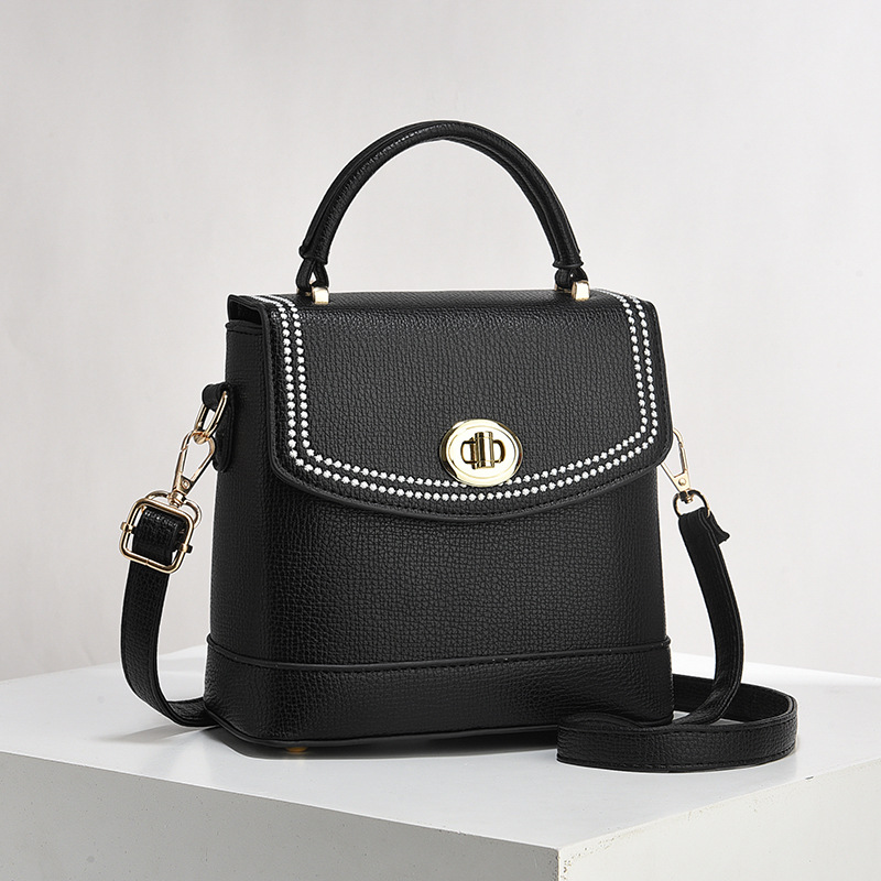Bolso de mujer nuevo nicho de diseño texturizado bolso de hombro de moda moda bolso de mano práctica mochila bolsas