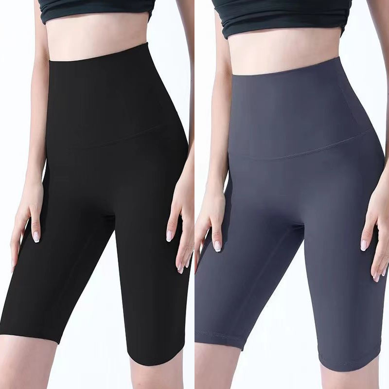 Pantalones cortos desnudos de mujer elásticos apretados para elevar las caderas de cinco puntos pantalones deportivos de secado rápido succión de sudor entrenamiento para correr fábrica de comercio de ping
