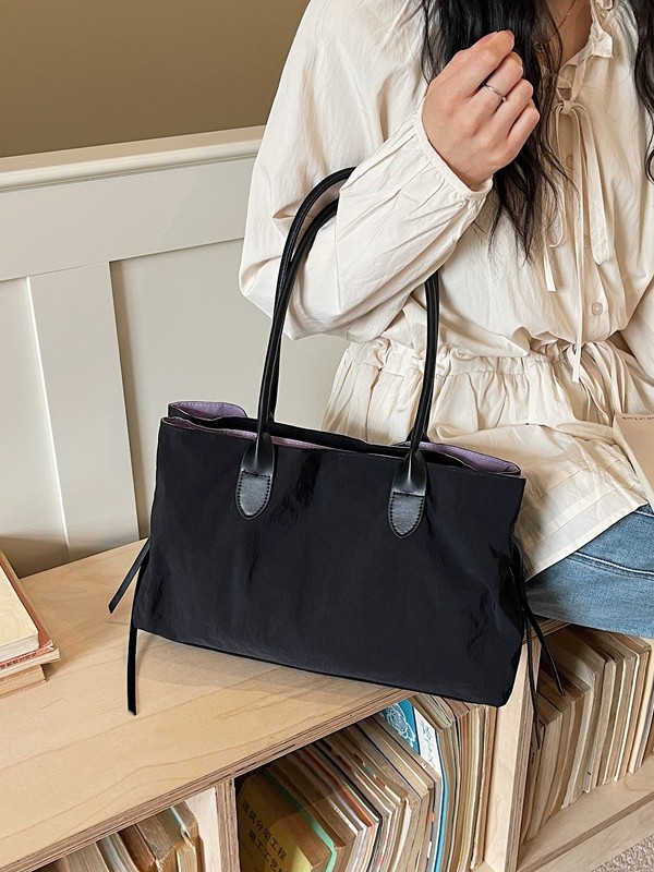 2026 nuevo paquete de moda de tela de alta capacidad, bolso de hombro de alta calidad, bolso de bolsillo pequeño y multifuncional.