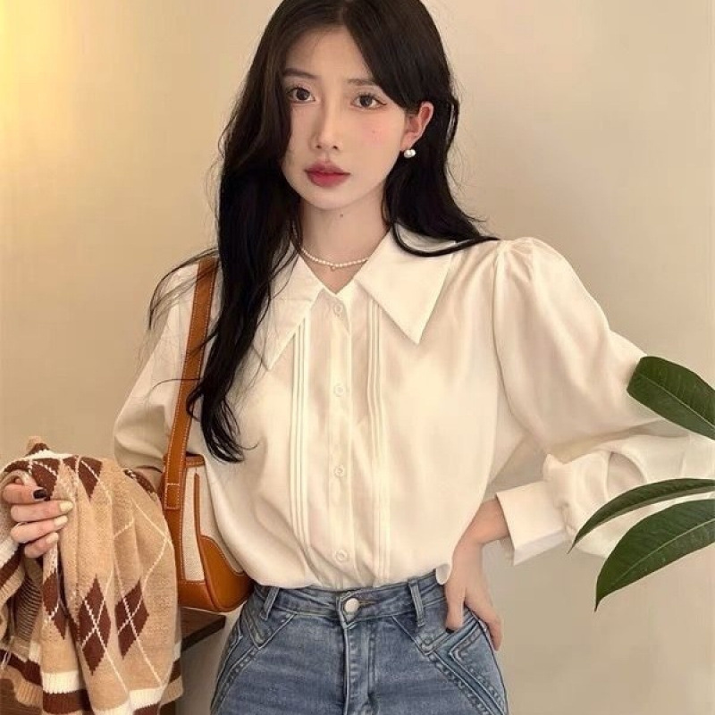 ドールカラーの白いシャツ、女性用春夏の新しいレイヤードオルガンプリーツシャツ、シックなデザインの長袖トップ|undefined