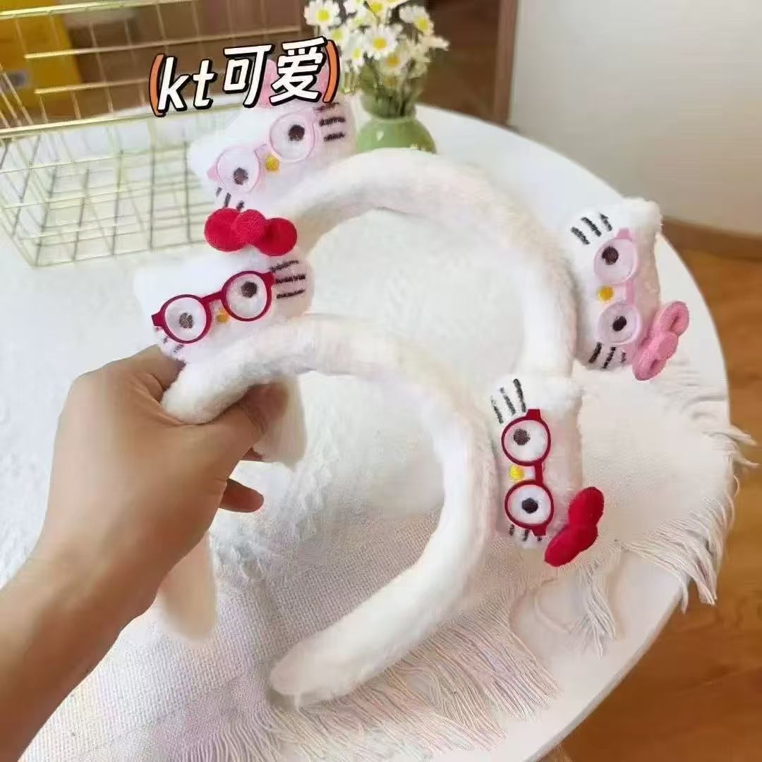 Nuevo tipo de peluche divertido Kitty cabello de gato lindos dibujos animados adornos para el cabello otoño y invierno lavado de la cara especial cabello al por mayor