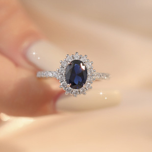 Internet celebrity live broadcast hot sale simulated ruby ​​sapphire dove egg-shaped ring for women high-end full diamond oval ring