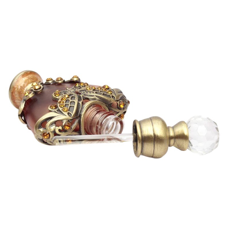 Fabricante de botellas de subenvasadas de perfume spot botella de aceite fino de 10ML al por mayor botella de perfume de Oriente Medio con incrustaciones de piedra en forma de corazón