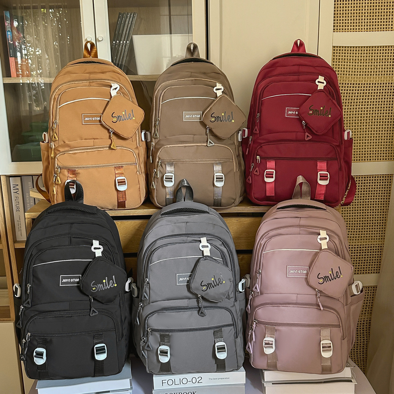 Mochila transfronteriza de alto valor de cara multicapa para reducir la carga, mochila de estudiantes de secundaria, mochila de dos piezas de computadora
