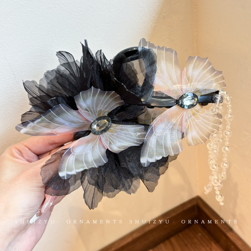 1 clip de agarre negro