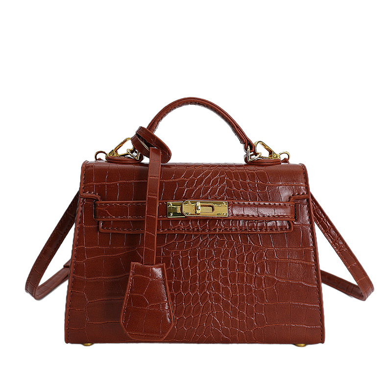 Bolso de mano caliente para mujeres 2025 nuevo estilo transfronterizo de alto nivel con patrón de cocodrilo lujoso y versátil bolso de hombro