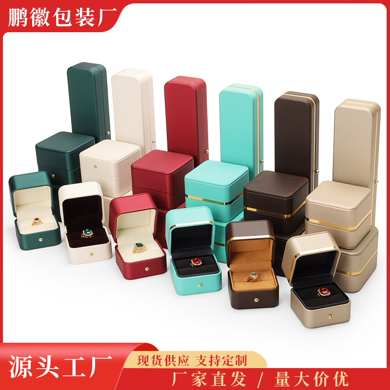 Caja de joyería de cuero de PU de borde dorado redondeado al por mayor caja de regalo de joyería de gama alta caja de reloj caja de joyería colgante de anillo