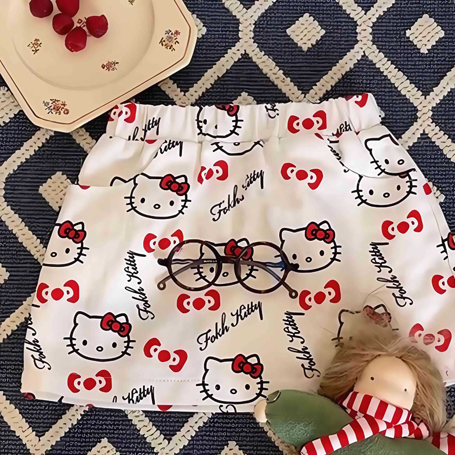 Niña redonda estrella infantil nueva falda corta tesoro femenino verano impresión completa KT gato falda de dibujos animados salvaje estilo occidental celebridad de Internet ropa para niños