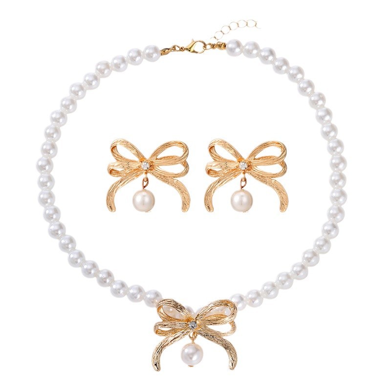 Joyas transfronterizas europeas y americanas moda imitación de perlas collar conjunto de aleación de estilo de lujo ligero lazo cadena de clavícula image 6