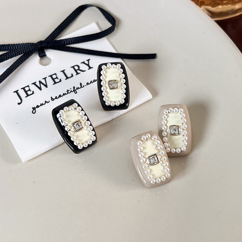 Sophisticated fashionable retro square small design elegant earrings…