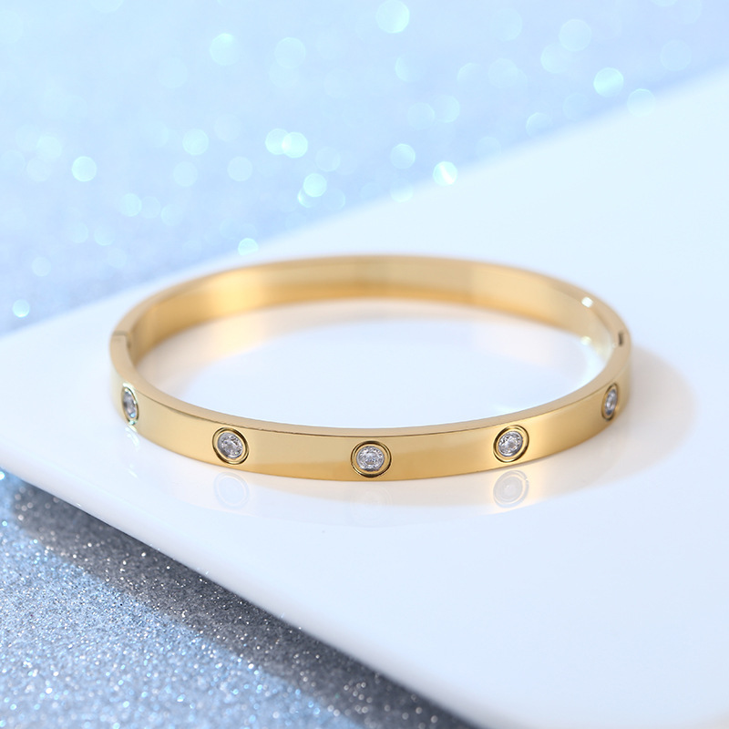 Pulsera de pareja de acero de titanio con 10 diamantes, diseño simple y elegante tipo cielo estrellado, venta al por mayor.