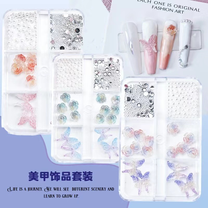 Transfronteriza nueva manicura tridimensional Camelia joyería líquido gradiente mariposa pequeña bola de acero perla mixta accesorios de uñas