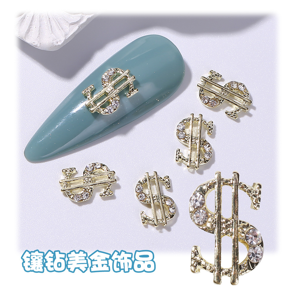 Joyería de uñas transfronteriza oro plata dólar símbolo moneda símbolo de uñas Luz de lujo flash diamante tridimensional decoración de diamantes