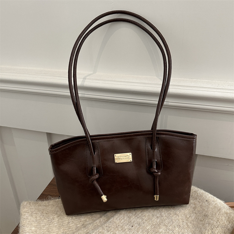 Alta sensación de viaje retro bolsas de gran capacidad para mujeres 2024 nuevo otoño invierno versátil bolsas de hombro de brazo bolsas especiales