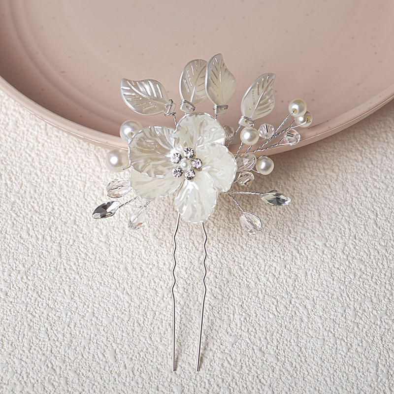 欧米のクロスボーダーは花嫁の結婚式の頭飾りの白い葉の花のU形のヘアピンを売ります。|undefined