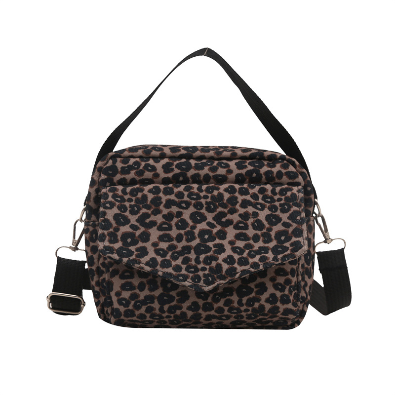 Casual nicho leopardo bolso damas 2024 nueva bolsa de lona de gran capacidad alta sensación de bolso pequeño bolso de teléfono móvil