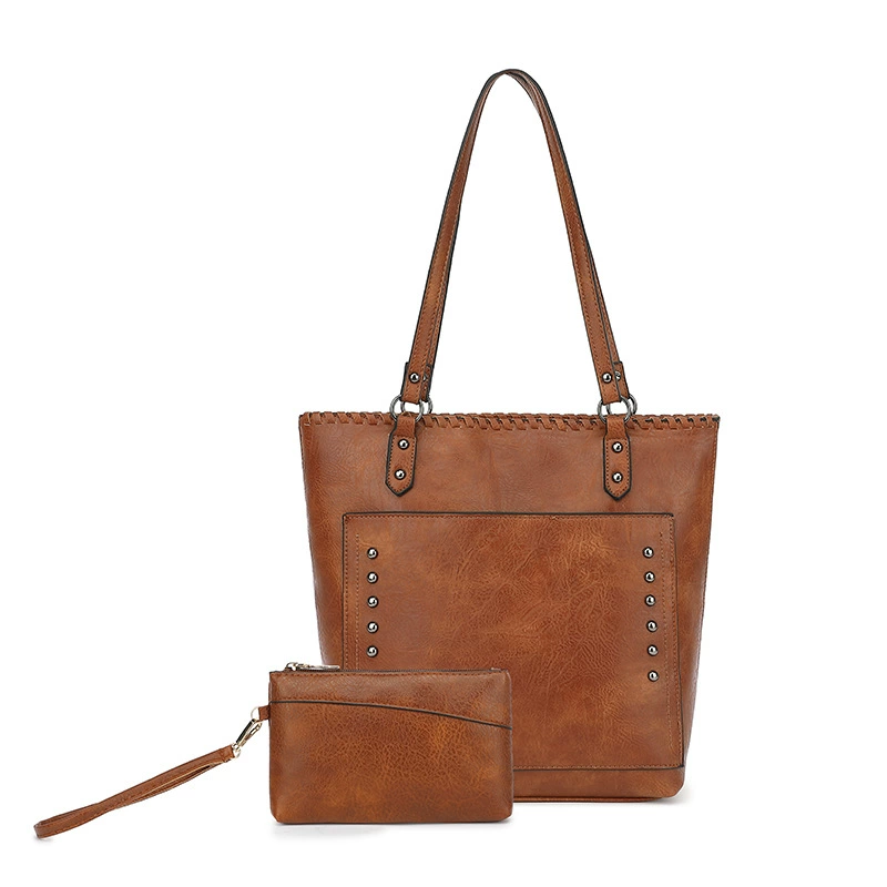 Гуанчжоу женская сумка 2025 новый простой европейский и американский ветер большая сумка из мягкой кожи большой емкости на плече портативная сумка Тота трансграничный ветер