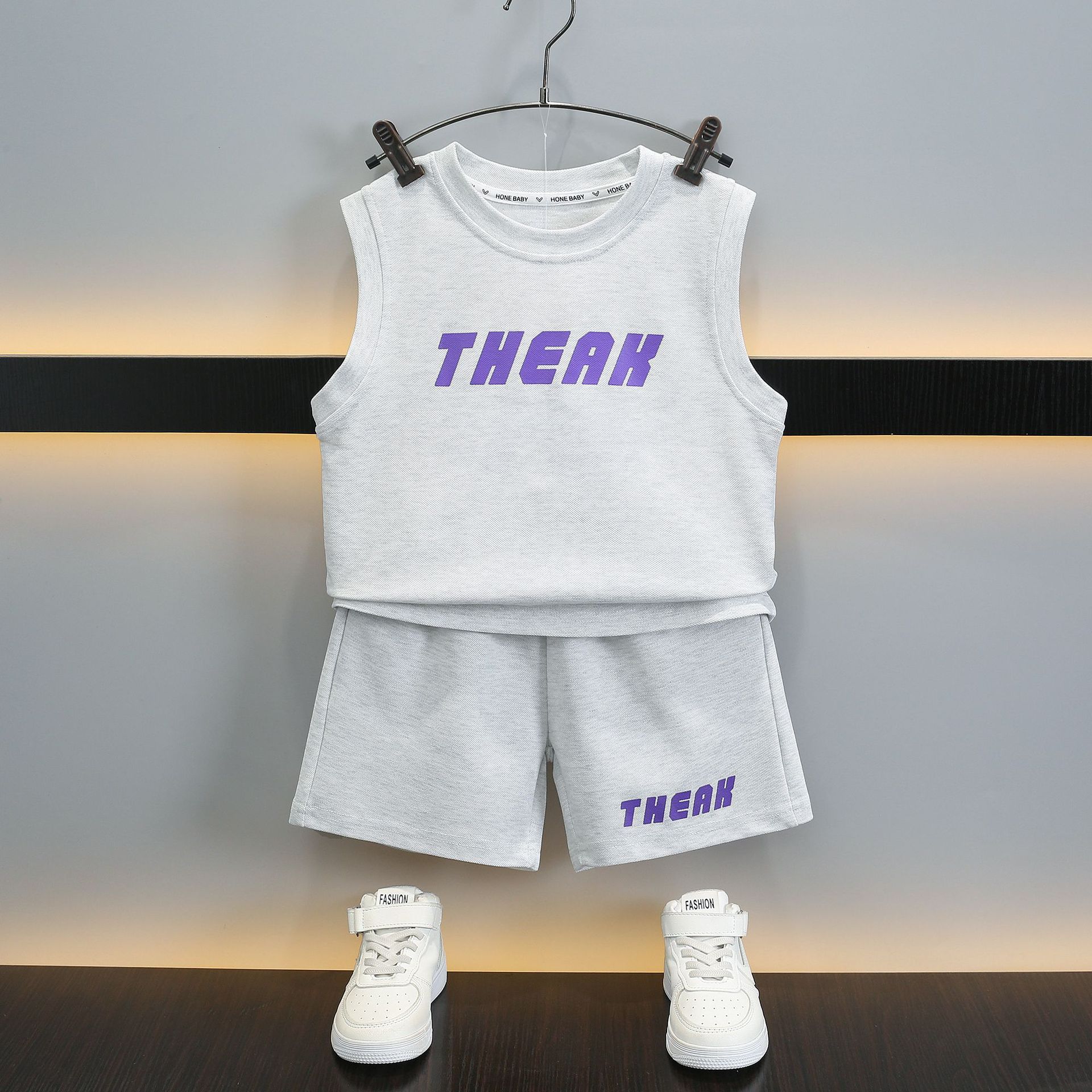 7363 traje de niño verano 2025 nuevos pantalones cortos de chaleco sin mangas delgados para niños estilo de verano deporte de dos piezas verano