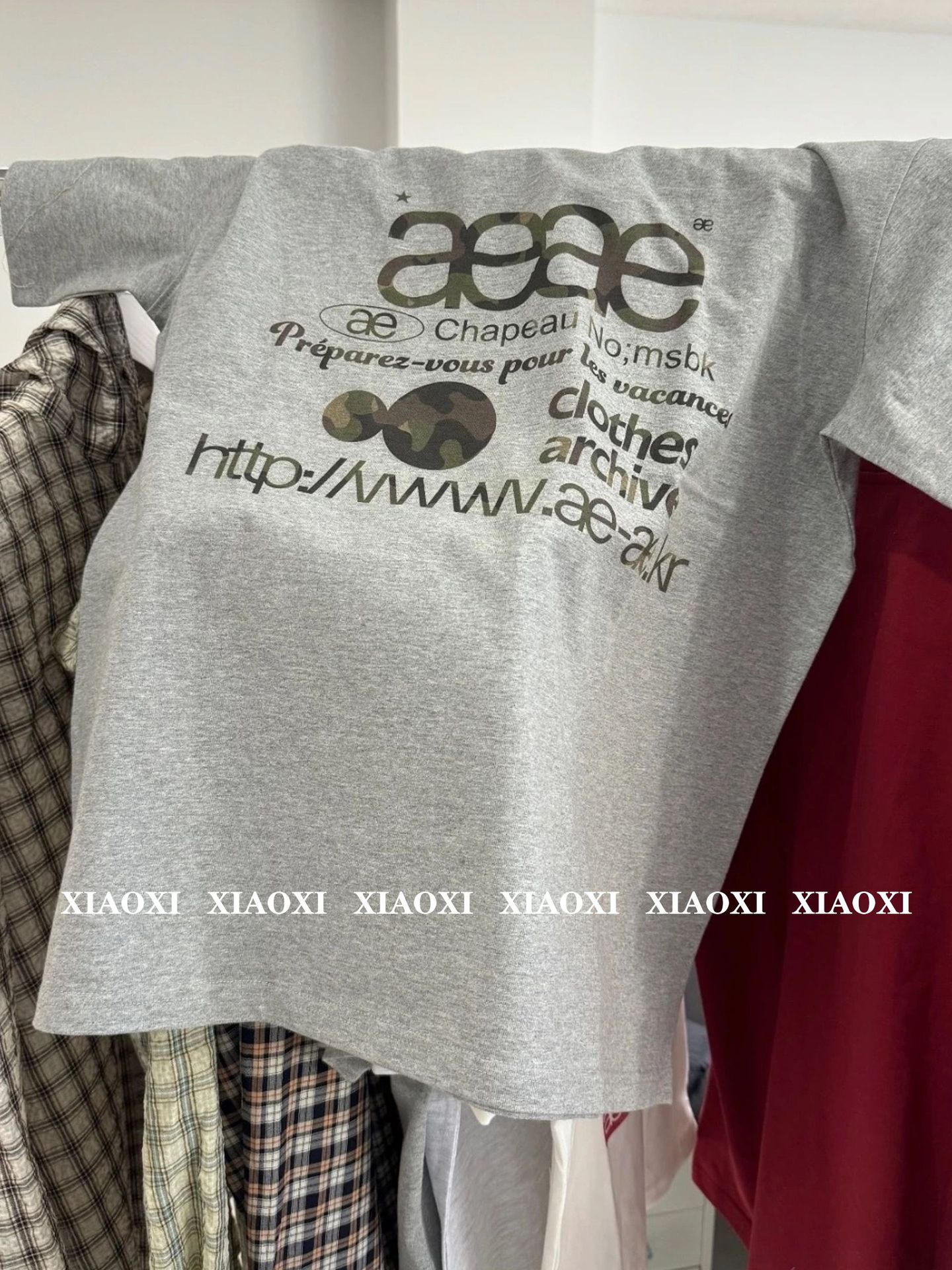 2025夏の新型韓国デザイナーのレトロae * e波点半袖tシャツの女性の丸襟が痩せて見える短い上着