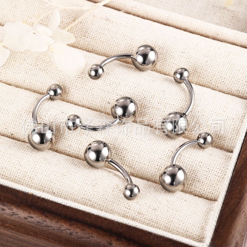 Silver pointed spike labret stud material detail