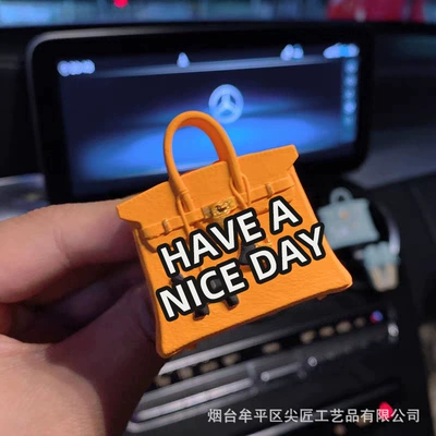 replica of trendy bags and | Car Perfume Aromatherapy - orange-pony-bag