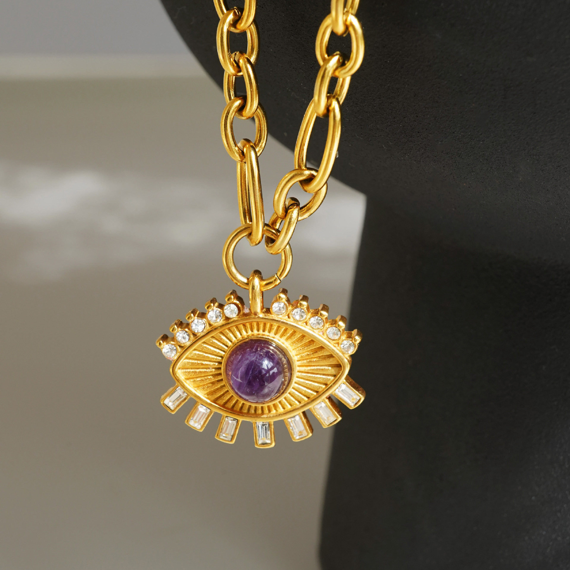 28g Weight Ion Plating (IP) Gold Plating Process 18K Gold Plated Plating Material Wholesale Jewelry IG Style Retro Devil's Eye Titanium Steel Zircon 18K Gold Plated Hollow Out Inlay Pendant Necklace