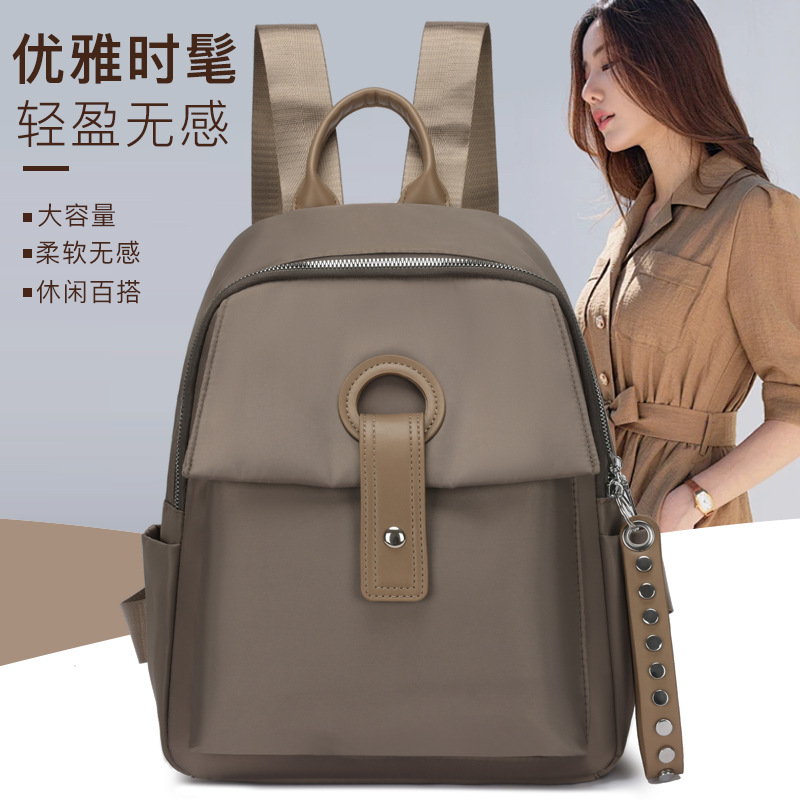 2024 verano nueva mochila de tela Oxford para mujer, color sólido, simple y ligero, mochila de viaje de viaje, mochila escolar al por mayor