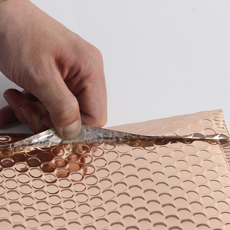 Oro Rosa aluminizado burbuja expreso sobre bolsa yiyoubao Impresión logotipo impermeable papel de aluminio película espuma bolsa a prueba de golpes