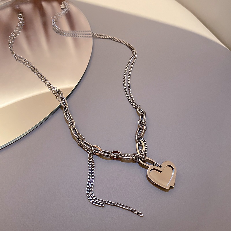 Vintage Tassel Heart Pendant Hollow Chain Titanium Steel Necklace Wholesale display picture 5
