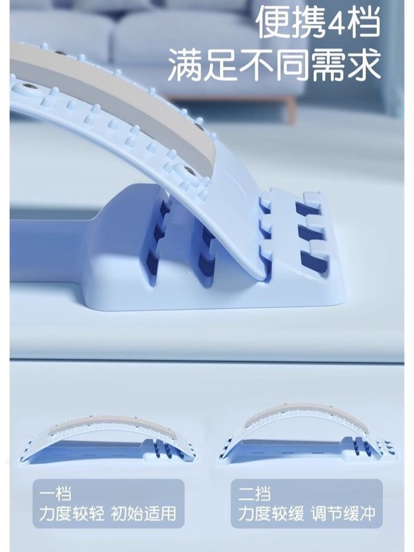 腰椎緩和器クッション腰の痛みの間に、理学療法マッサージ器の家庭用ストレッチ牽引矯正の神器が突出しています。|undefined