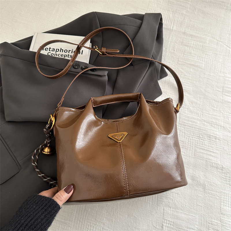 2024 alto valor retrógrado estilo de negocios Meillard bolso de cubo de mano de viaje versátil de invierno nuevo bolso de hombro