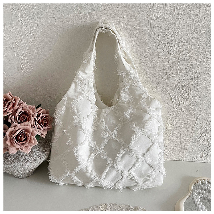 Batik-Rohstoff Creme-Weiß Quaste Canvas Rucksack Schultasche Damen Rucksack Weste Rucksack Großvolumen literarischer Batik-Handwerksstil