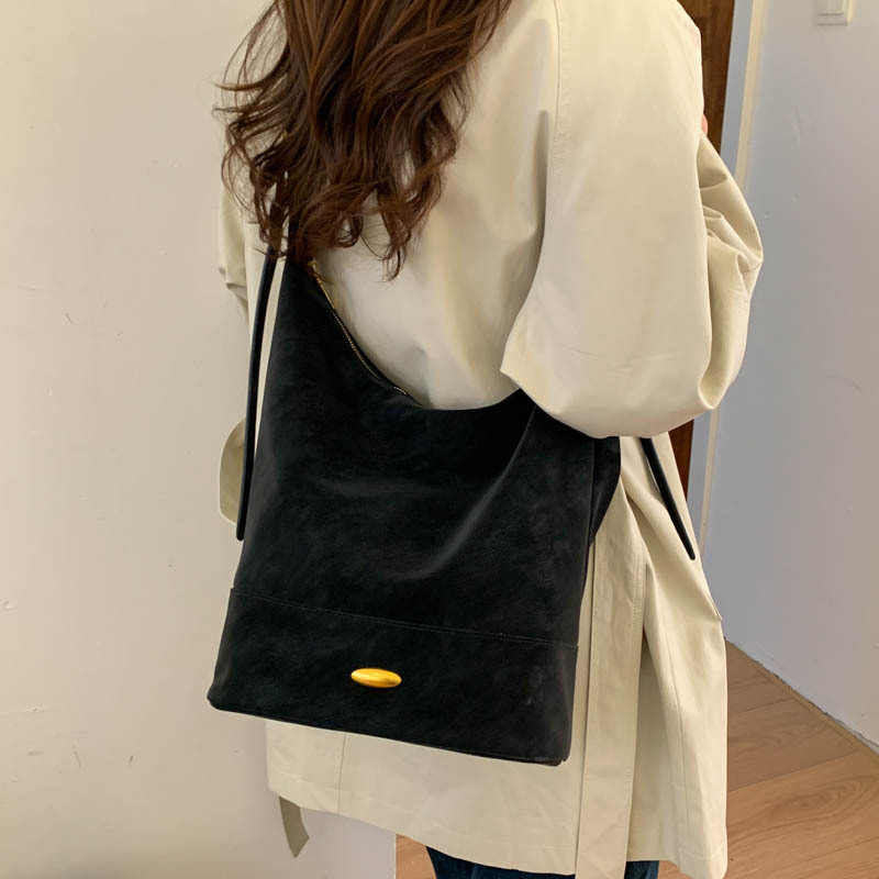 Coreano relajado sensación de colapsar bolso de cubo de seda bolso de mujer 2025 nuevo retro bolso de hombro bolso de viaje