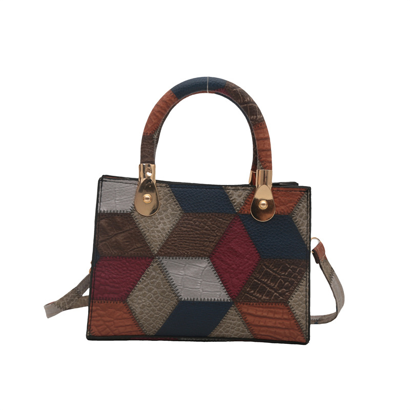 Nueva bolsa de hombro de mujer simple empalme de moda de gran capacidad bolsa de mano PU cuero suave sensación casual portátil ligero