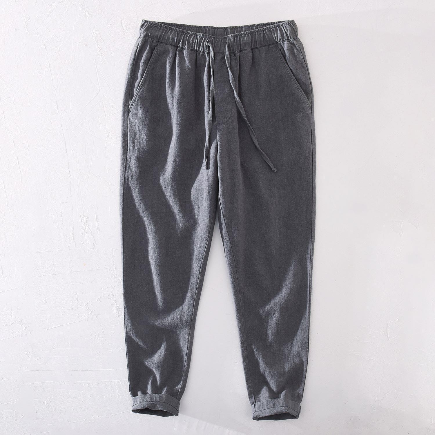 Pantalones casuales de lino rectos de algodón y lino con cintura elástica retro extremadamente cáñamo pantalones de lino sueltos de todo fósforo con cordón para hombres